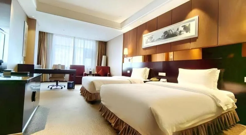 Bed in Xian Grand Soluxe International Hotel