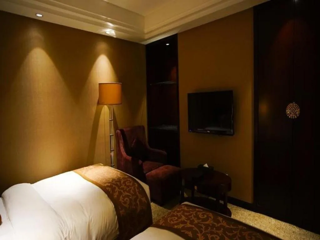 Bed in Xian Grand Soluxe International Hotel