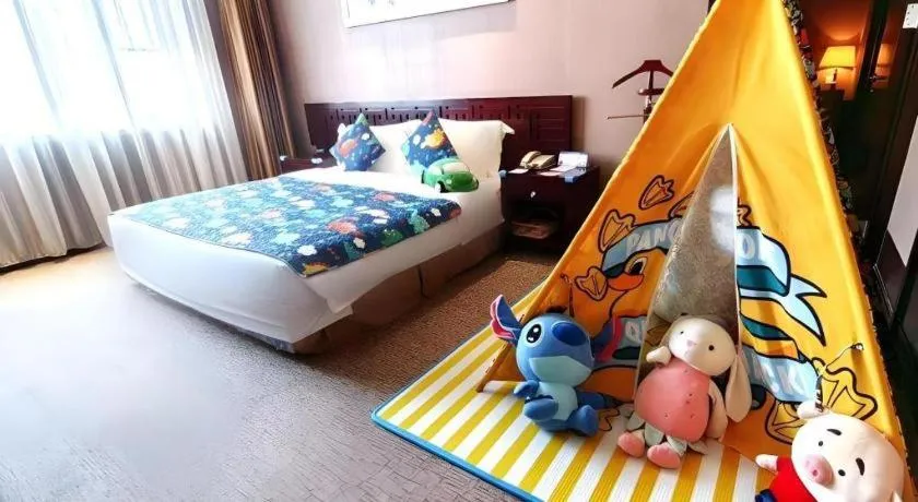 Bed in Xian Grand Soluxe International Hotel