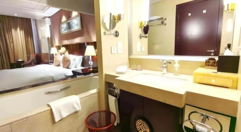 Bed in Xian Grand Soluxe International Hotel