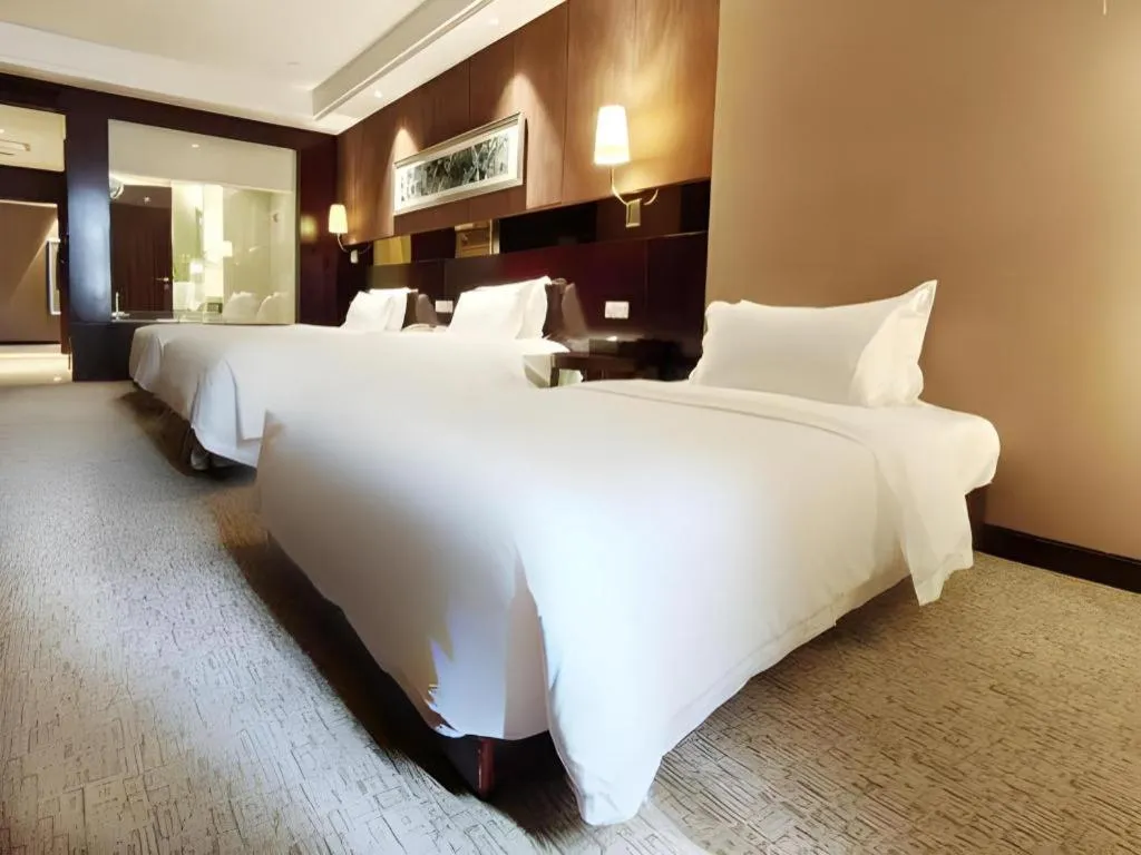 Bed in Xian Grand Soluxe International Hotel