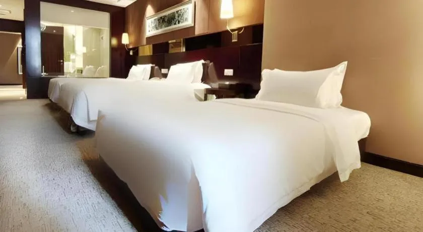 Bed in Xian Grand Soluxe International Hotel