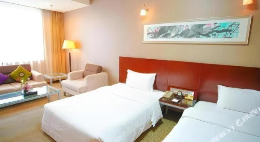 Bed in Xian Grand Soluxe International Hotel