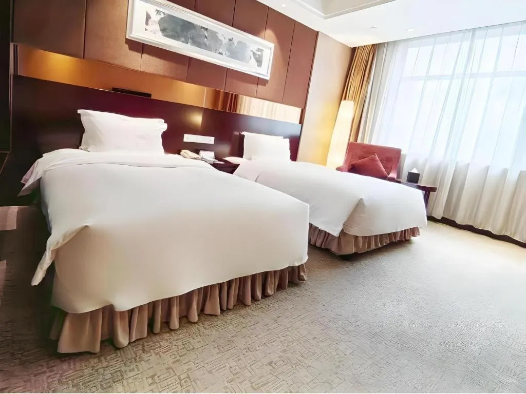 Bed in Xian Grand Soluxe International Hotel