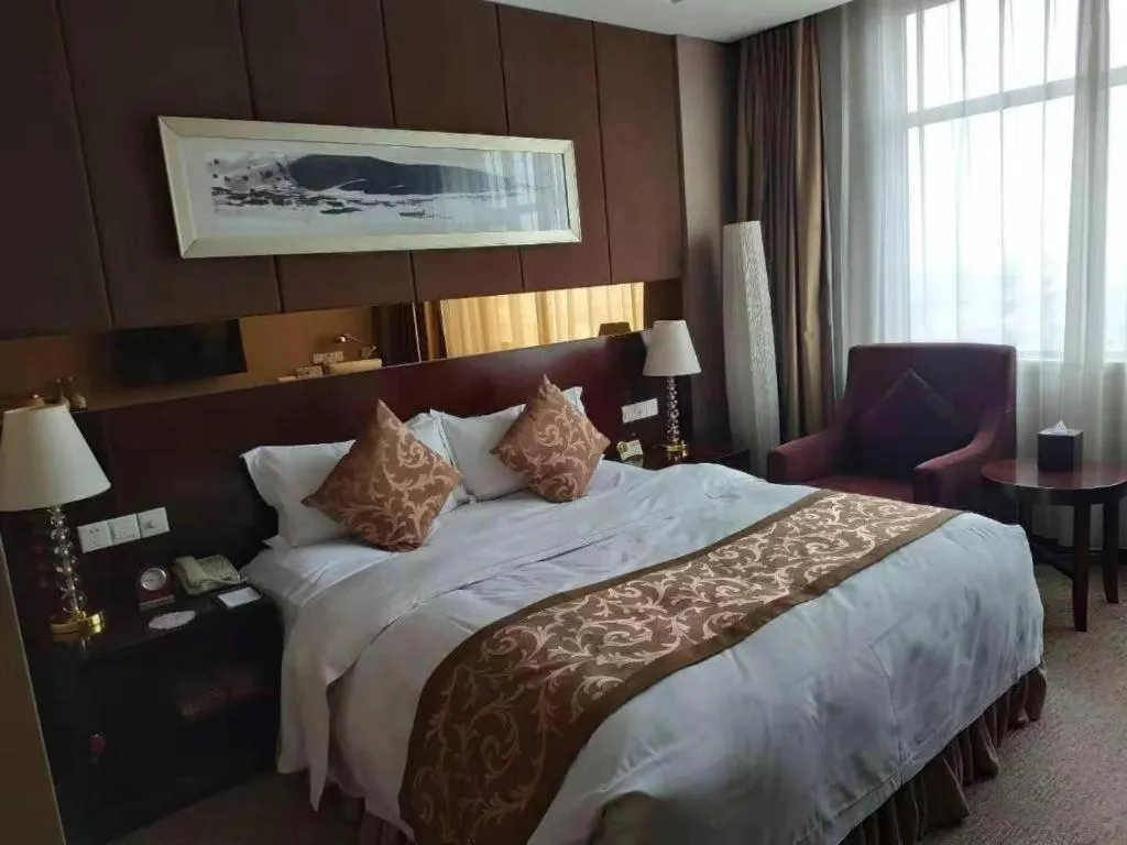 Bed in Xian Grand Soluxe International Hotel