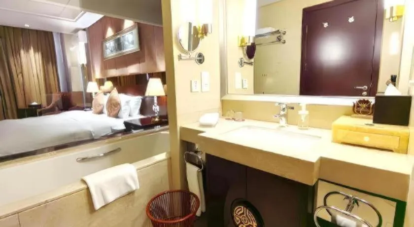 Bed in Xian Grand Soluxe International Hotel