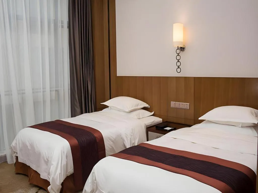 Bed in Shanghai Manhattan Hotel Minhang