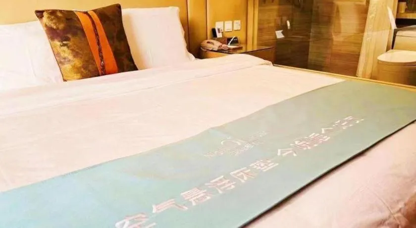 Bed in Shanghai Manhattan Hotel Minhang