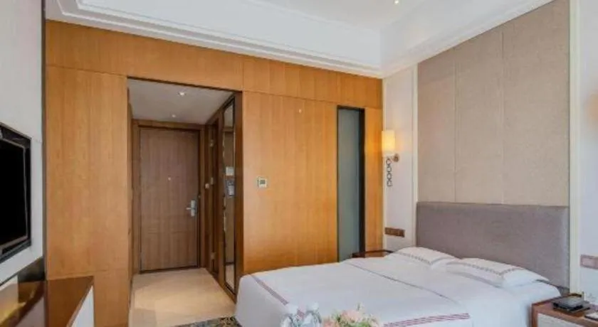 Bed in Shanghai Manhattan Hotel Minhang