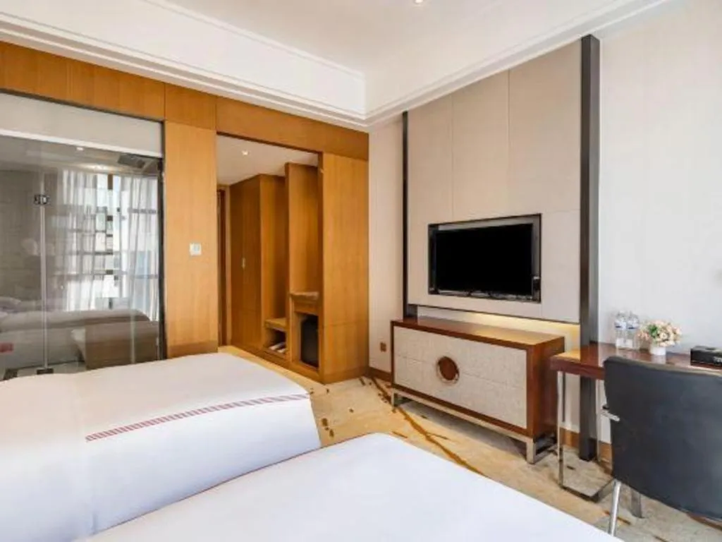 Bed in Shanghai Manhattan Hotel Minhang