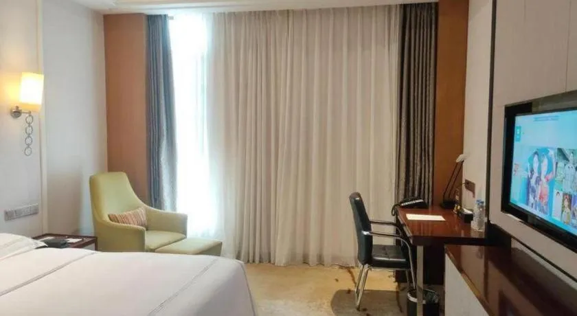 Bed in Shanghai Manhattan Hotel Minhang