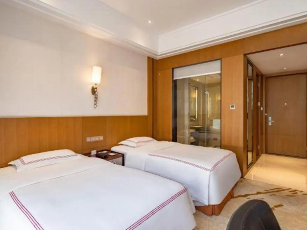 Bed in Shanghai Manhattan Hotel Minhang