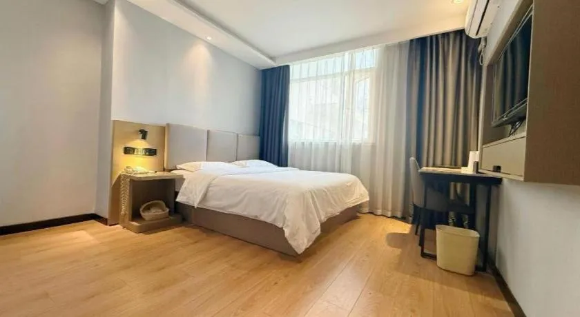 Bed in GreenTree Inn Hefei East Wangjiang Road CTCE Express Hotel