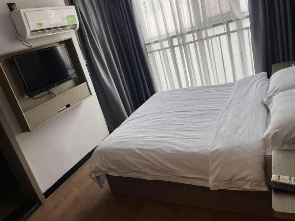 Bed in GreenTree Inn Hefei East Wangjiang Road CTCE Express Hotel