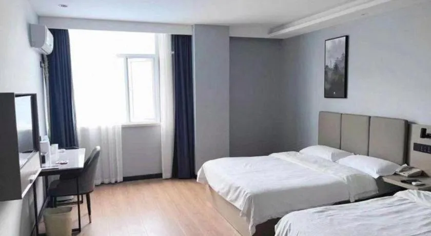 Bed in GreenTree Inn Hefei East Wangjiang Road CTCE Express Hotel