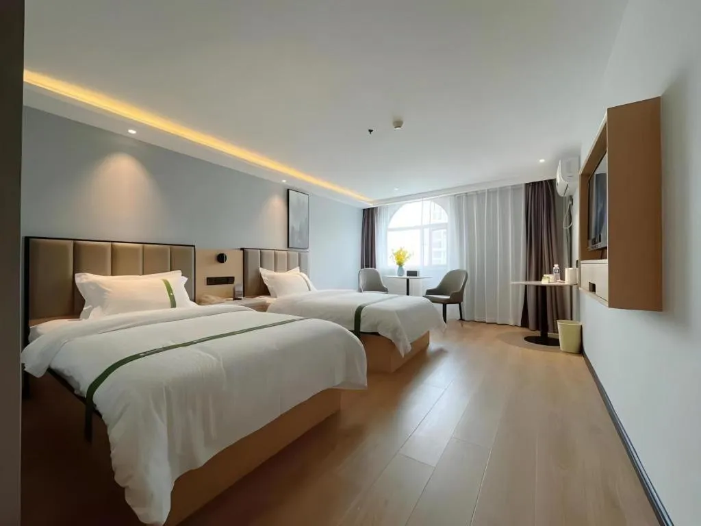 Bed in GreenTree Inn Hefei East Wangjiang Road CTCE Express Hotel