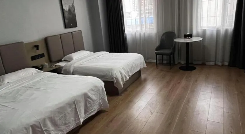 Bed in GreenTree Inn Hefei East Wangjiang Road CTCE Express Hotel