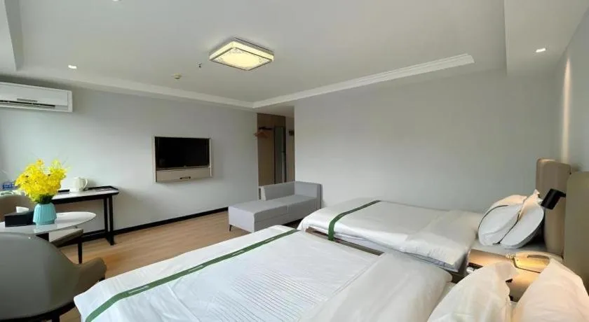 Bed in GreenTree Inn Hefei East Wangjiang Road CTCE Express Hotel
