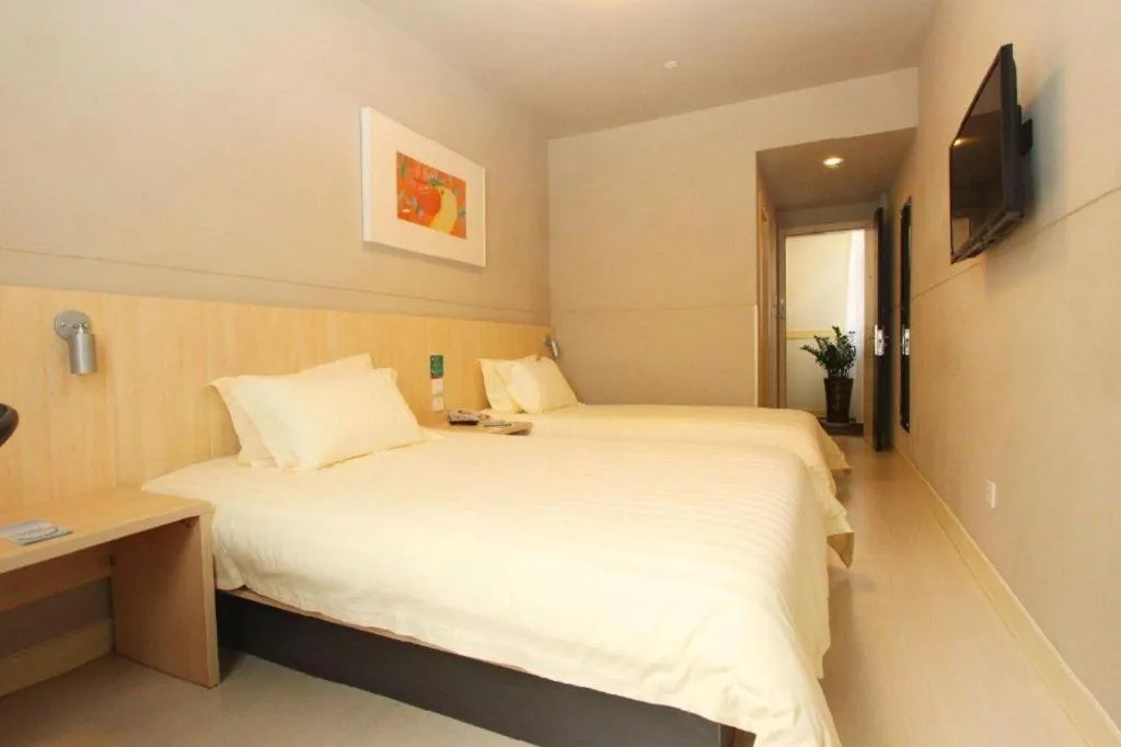 Bed in Jinjiang Inn Wuhan Linjiaohu Wanda Branch