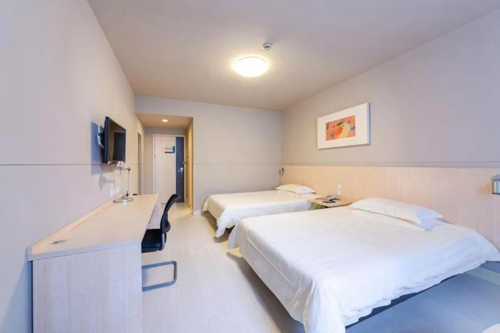 Bed in Jinjiang Inn Wuhan Linjiaohu Wanda Branch