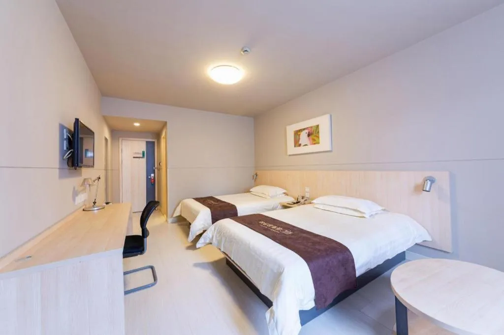 Bed in Jinjiang Inn Wuhan Linjiaohu Wanda Branch