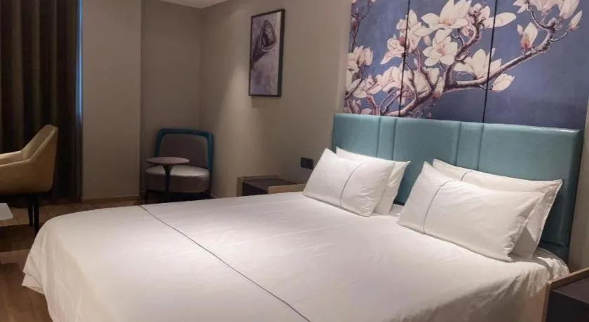 Bed in Jinjiang Inn Wuhan Linjiaohu Wanda Branch