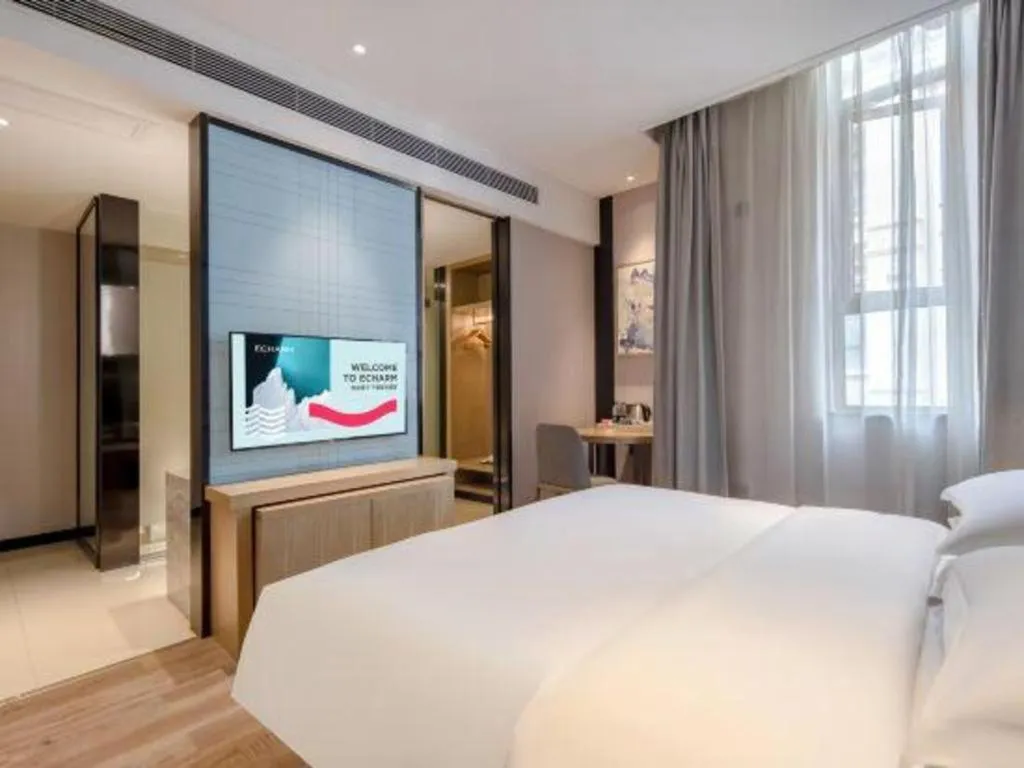 Bed in Echarm Hotel Baise Sports Center Dream Island Plaza