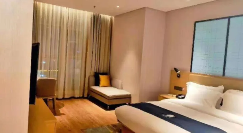 Bed in Echarm Hotel Baise Sports Center Dream Island Plaza