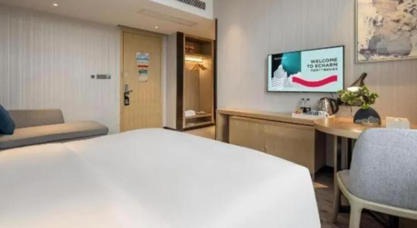 Bed in Echarm Hotel Baise Sports Center Dream Island Plaza