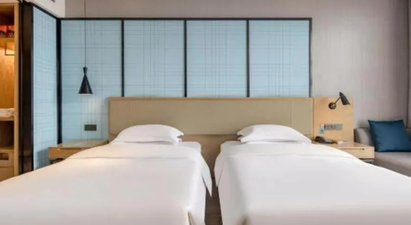 Bed in Echarm Hotel Baise Sports Center Dream Island Plaza