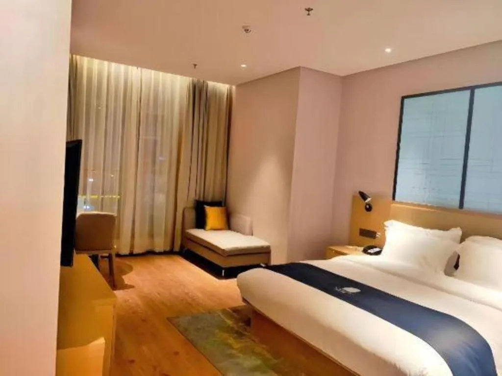 Bed in Echarm Hotel Baise Sports Center Dream Island Plaza