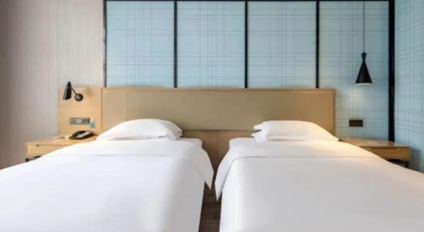 Bed in Echarm Hotel Baise Sports Center Dream Island Plaza