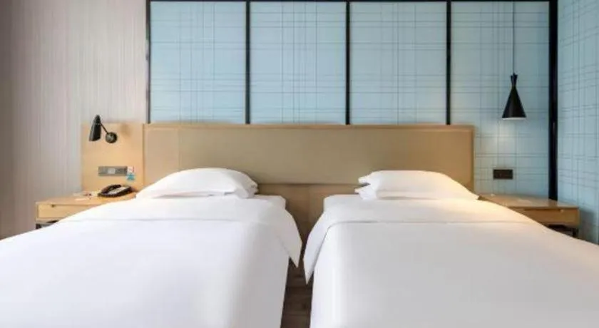 Bed in Echarm Hotel Baise Sports Center Dream Island Plaza