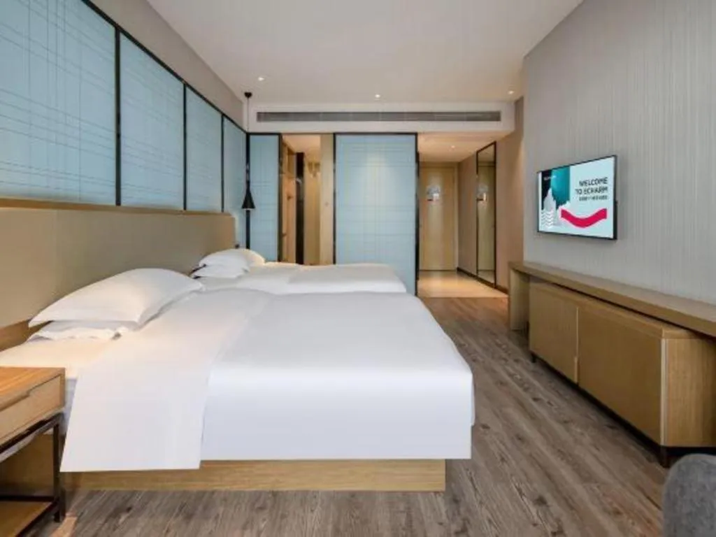 Bed in Echarm Hotel Baise Sports Center Dream Island Plaza