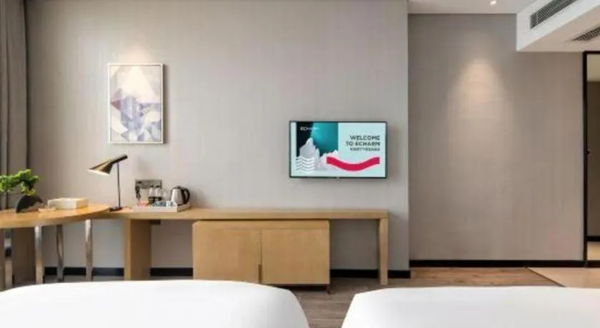 Bed in Echarm Hotel Baise Sports Center Dream Island Plaza