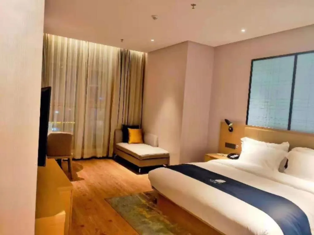 Bed in Echarm Hotel Baise Sports Center Dream Island Plaza