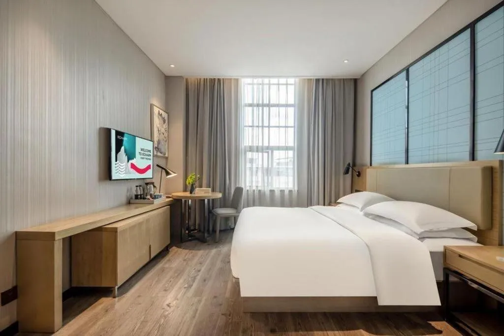 Bed in Echarm Hotel Baise Sports Center Dream Island Plaza