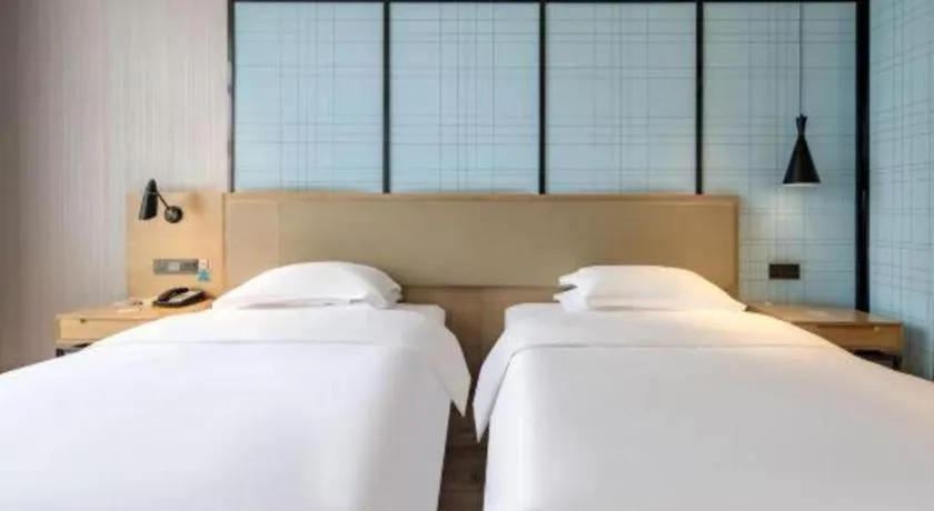 Bed in Echarm Hotel Baise Sports Center Dream Island Plaza