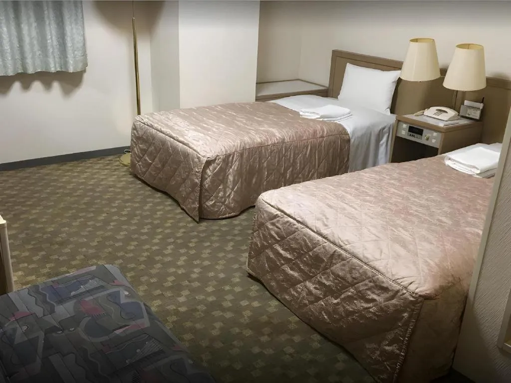 Bed in Hotel IL FIORE Kasai ANNEX