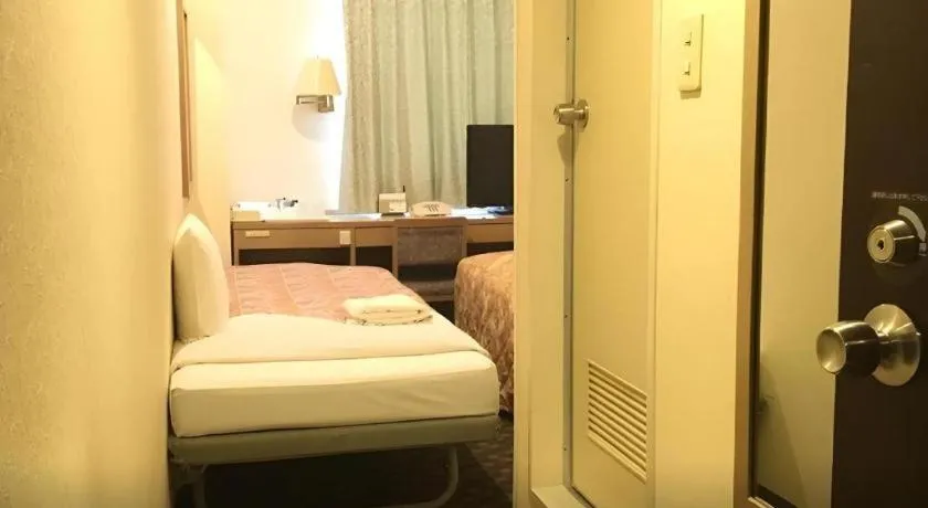 Bed in Hotel IL FIORE Kasai ANNEX