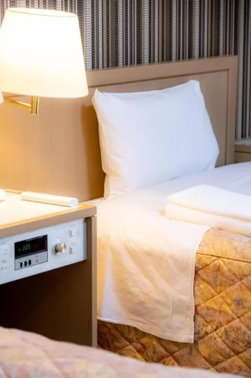 Bed in Hotel IL FIORE Kasai ANNEX