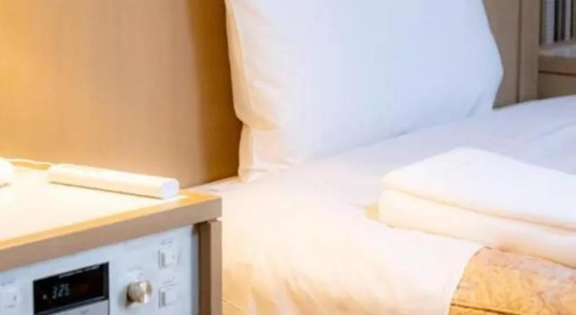 Bed in Hotel IL FIORE Kasai ANNEX