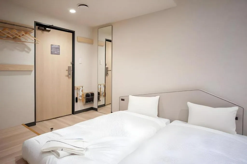 Bed in Hotel IL FIORE Kasai ANNEX