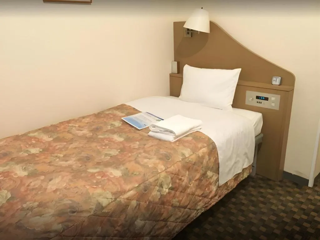 Bed in Hotel IL FIORE Kasai ANNEX