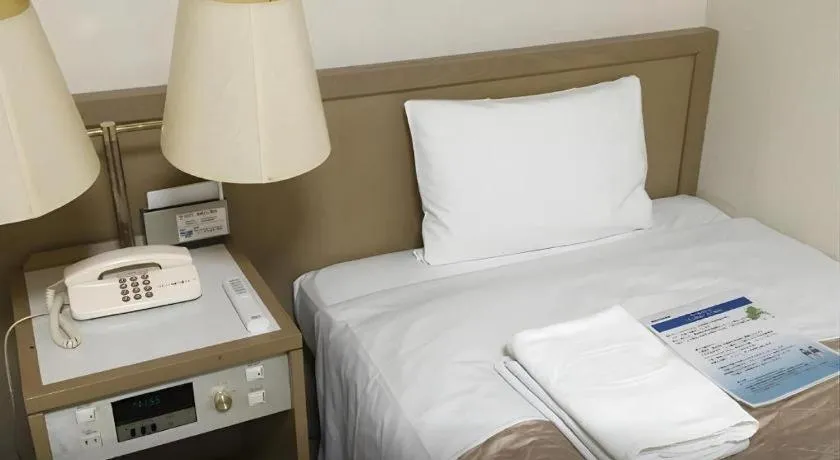 Bed in Hotel IL FIORE Kasai ANNEX