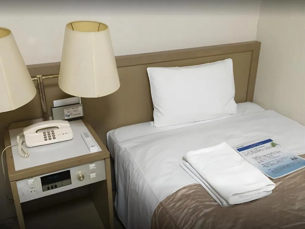 Bed in Hotel IL FIORE Kasai ANNEX