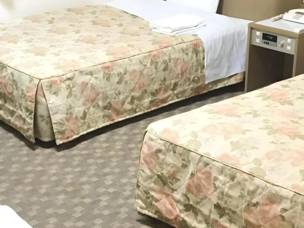 Bed in Hotel IL FIORE Kasai ANNEX