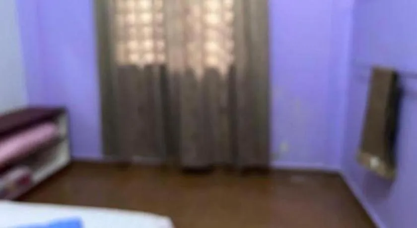 Bed in OYO 90967 Homestay Chalet Warisan Siti