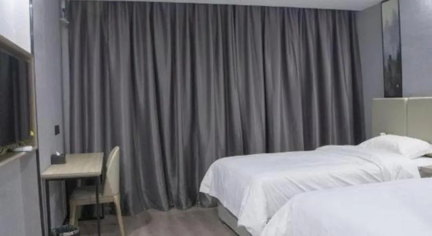Bed in GreenTree Inn Anqing Tongcheng South Shengtang Road Shengtang International Business Hotel