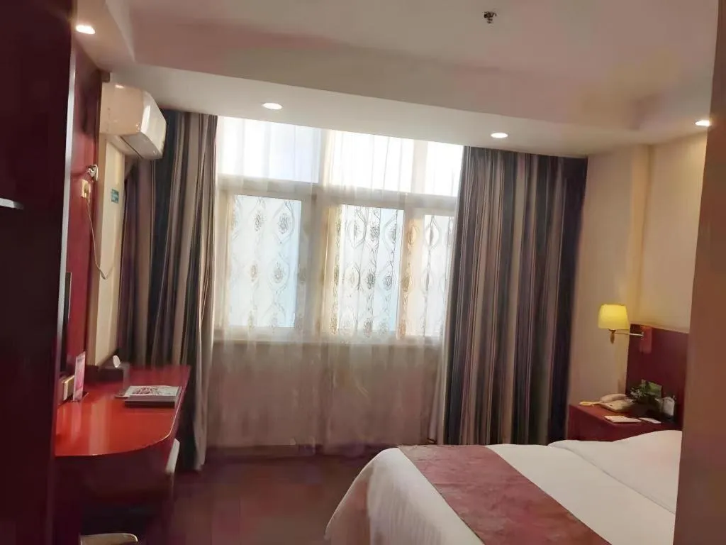 Bed in GreenTree Inn Anqing Tongcheng South Shengtang Road Shengtang International Business Hotel
